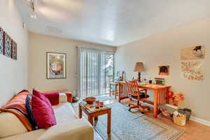 Office featuring wood finished floors and baseboards