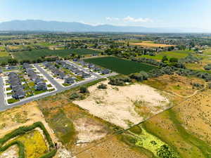 Overview of rural landscape with a mountainous background