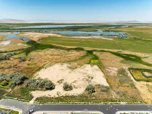 Aerial view of property's location with a water and mountain view