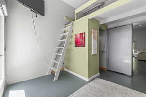 Bedroom 2 with lofted bed and closet