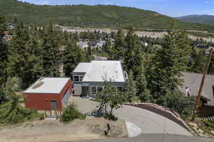 View from above of property featuring a mountainous background
