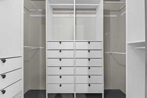 View of walk in closet in Primary Bedroom