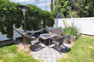 View of patio featuring a fire pit