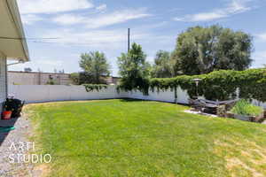 View of fenced backyard