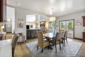 Dining room with built in desk and French doors