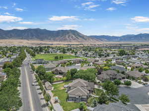 View of mountain background featuring nearby suburban area