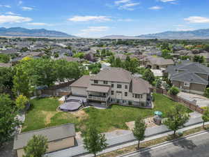 Aerial view of residential area with a mountainous background