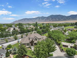 View of mountain background featuring nearby suburban area