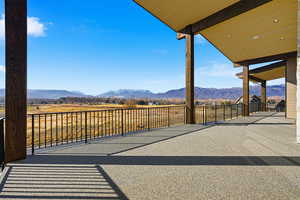 View of patio / terrace with a mountain view