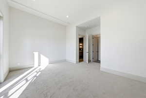 Spare room with carpet flooring and baseboards