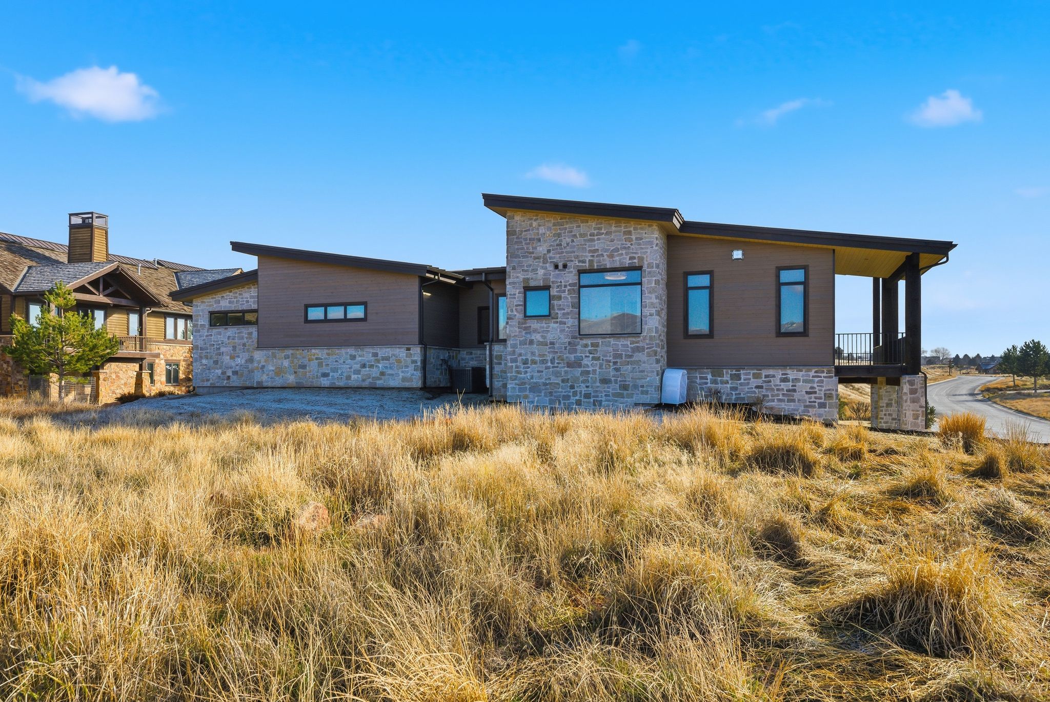 View of front of property featuring stone siding