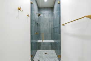 Bathroom with a tile shower