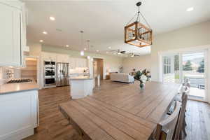 Dining room featuring recessed lighting, wood finished floors, and ceiling fan