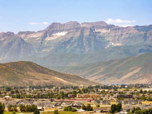 View of mountain background with nearby suburban area