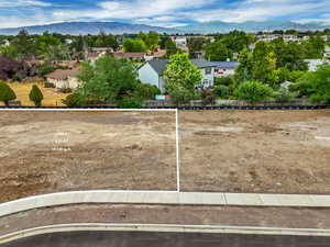 View of yard with a mountain view and a residential view