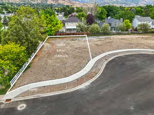 Surrounding community featuring a residential view and a mountain view
