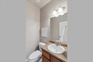 Bathroom featuring toilet and vanity