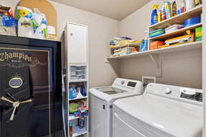 Laundry room with separate washer and dryer