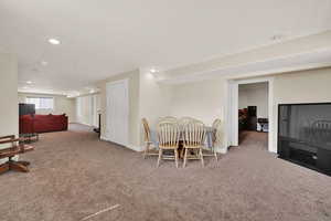 Dining space with carpet and recessed lighting