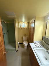 Full bath with vanity and a stall shower