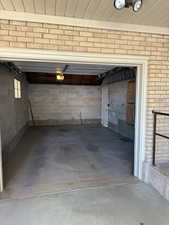 Garage featuring a garage door opener