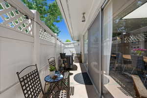 Fenced backyard with a patio area