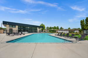 Community pool featuring a patio area