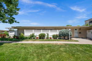 View of front of property with brick siding