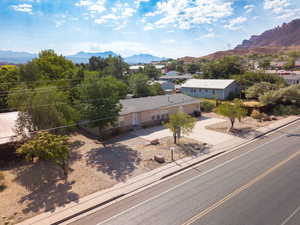 View of subject property featuring a mountain backdrop