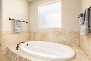 Bathroom with a jetted tub