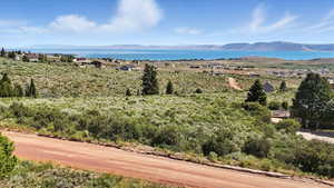 Mountain view featuring a nearby body of water