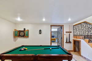 Playroom with pool table and recessed lighting