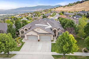 Aerial view of residential area with a mountainous background