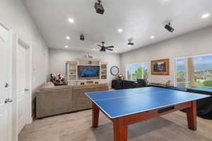Rec room featuring recessed lighting, ceiling fan, and light carpet