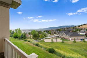 View of mountain background featuring nearby suburban area