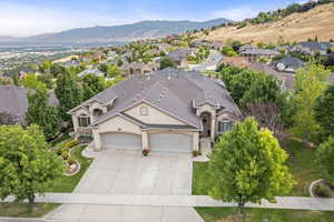 Aerial perspective of suburban area with a mountain backdrop