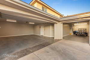 Garage with concrete driveway
