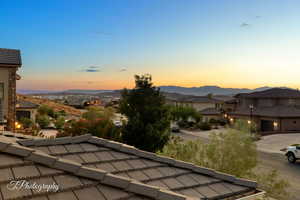 View of mountain background featuring nearby suburban area