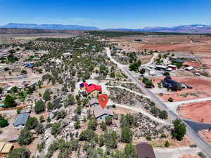 Bird's eye view of a mountainous background and a desert landscape