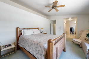 Bedroom featuring carpet flooring and ceiling fan