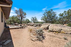 View of yard with a deck