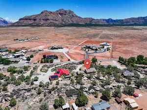 Aerial overview of property's location with mountains and rural landscape