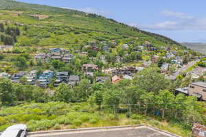 Aerial perspective of suburban area featuring a mountainous background