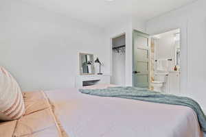 Bedroom featuring ensuite bathroom