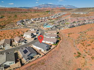 View of property location with nearby suburban area and mountains