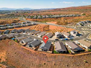 Aerial view of residential area with a mountainous background