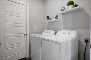Washroom with washing machine and dryer