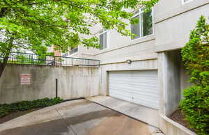 Garage featuring driveway