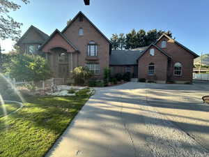 View of front facade featuring brick siding