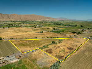 View of rural area featuring property parcel outlined and mountains